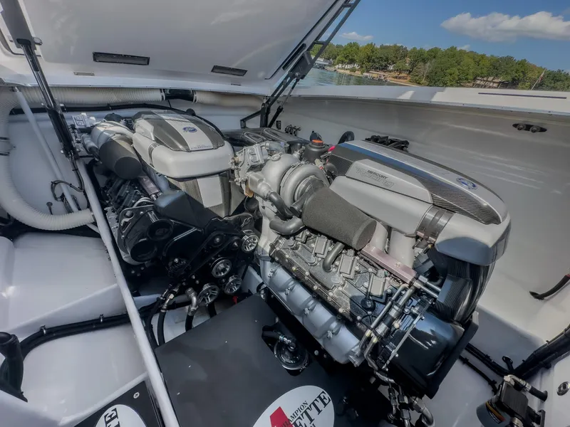 Slide: The Image of 2023 Cigarette 515 boat engine compartment with dual high-performance engines. - 34