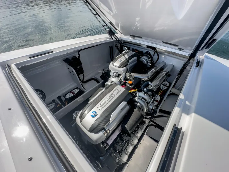 Slide: The Image of 2023 Cigarette 515 boat engine compartment with powerful twin engines. - 36