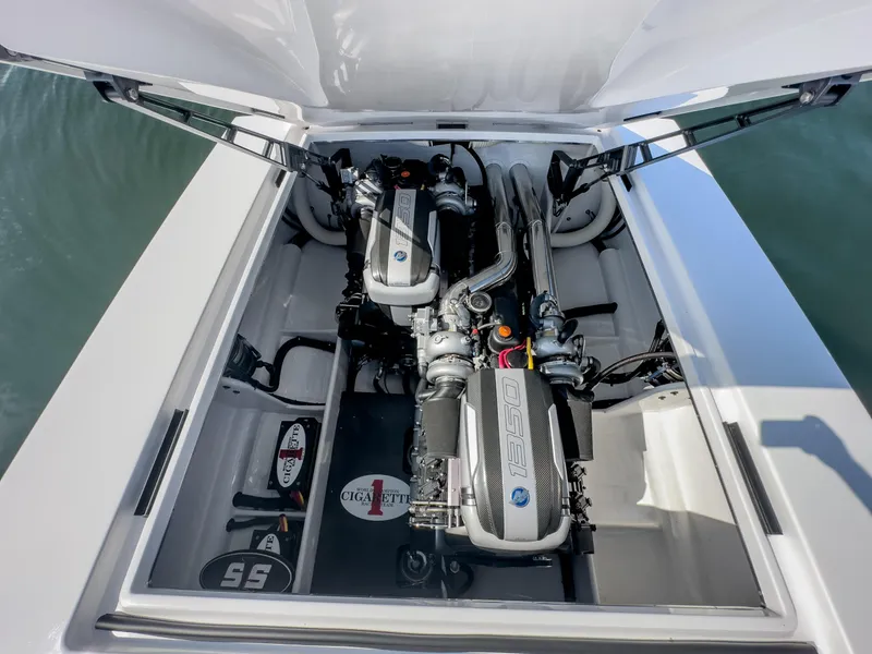 Slide: The Image of 2023 Cigarette 515 boat engine compartment with dual high-performance engines. - 37