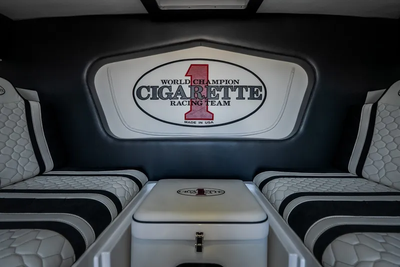 Slide: The Image of Interior of 2023 Cigarette 515 boat with luxury seating and racing team logo. - 65