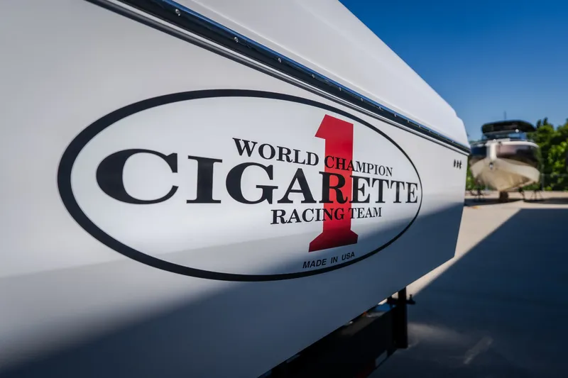 Slide: The Image of 2023 Cigarette 515 boat with "World Champion Racing Team" logo. - 27