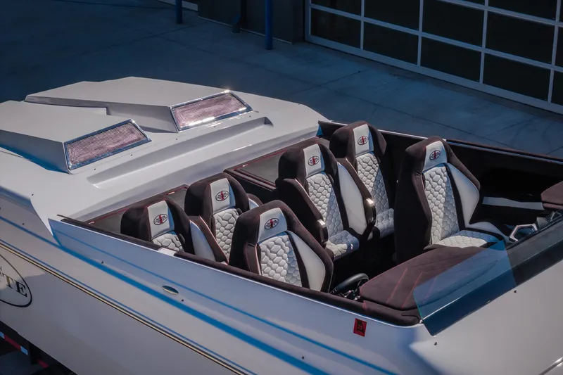 Slide: The Image of 2023 Cigarette 515 boat interior with luxurious seating and modern design. - 20