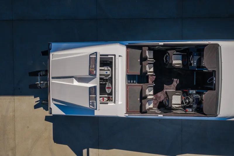 Slide: The Image of Overhead view of 2023 Cigarette 515 boat interior, showcasing seating and controls. - 74