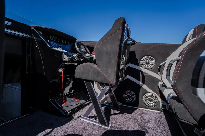 Slide: The Image of Interior of 2023 Cigarette 515 boat with modern dashboard and seating. - 33
