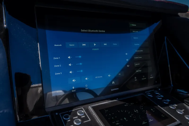 Slide: The Image of Touchscreen control panel in a 2023 Cigarette 515 boat, displaying audio settings. - 30