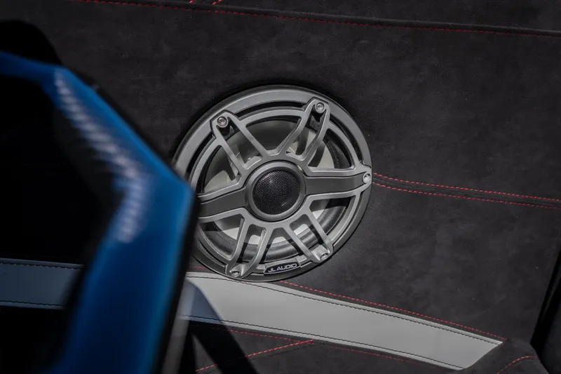 Slide: The Image of Speaker detail in 2023 Cigarette 515 boat interior with red stitching. - 37
