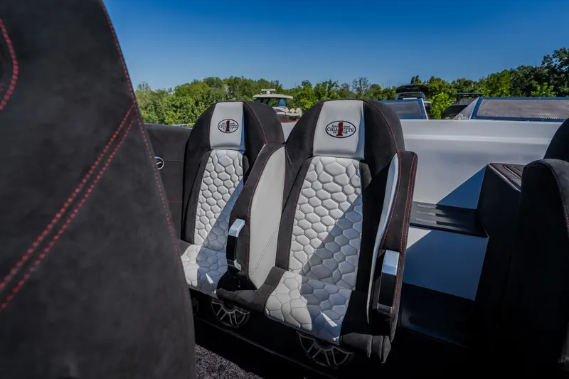 Slide: The Image of 2023 Cigarette 515 boat interior with luxurious seating and detailed stitching. - 58
