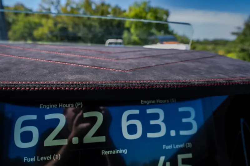 Slide: The Image of Dashboard of 2023 Cigarette 515 showing engine hours and fuel levels. - 40