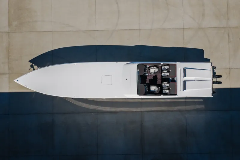 Slide: The Image of Aerial view of 2023 Cigarette 515 boat on concrete surface. - 18