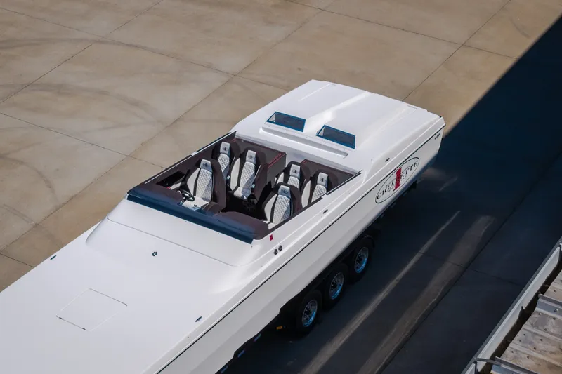 Slide: The Image of 2023 Cigarette 515 powerboat with sleek design and luxurious seating on display. - 66