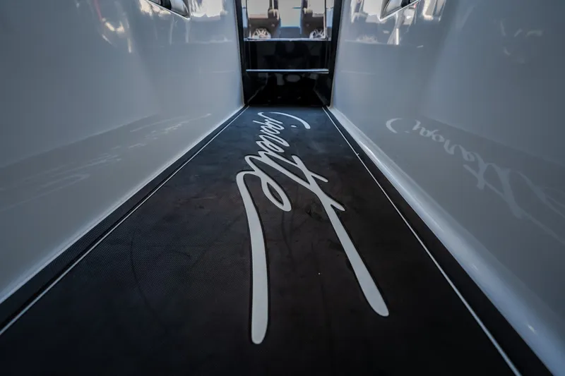 Slide: The Image of Interior view of 2023 Cigarette 515 boat with sleek design and signature branding. - 52