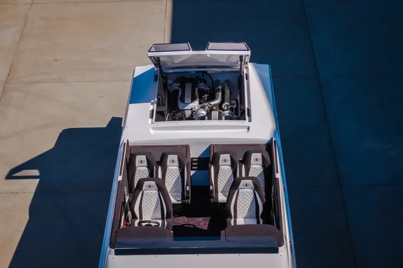 Slide: The Image of Overhead view of 2023 Cigarette 515 boat interior and engine compartment. - 73