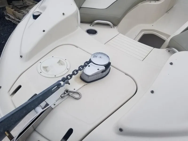 Slide: The Image of 2006 Sea Ray 270 Sundeck boat deck with anchor chain and seating area. - 15