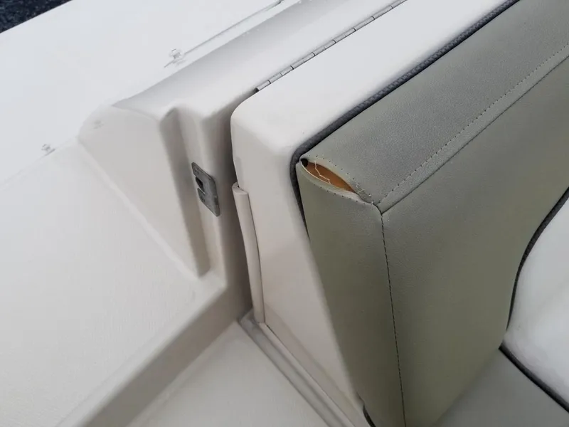 Slide: The Image of Torn upholstery on a 2006 Sea Ray 270 Sundeck boat seat. - 22