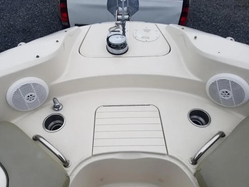 Slide: The Image of 2006 Sea Ray 270 Sundeck boat deck with speakers and cup holders. - 36