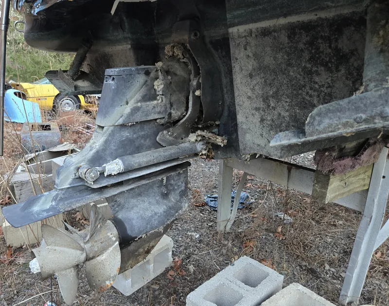 Slide: The Image of 2006 Sea Ray 270 Sundeck boat propeller and stern drive on cinder blocks. - 6