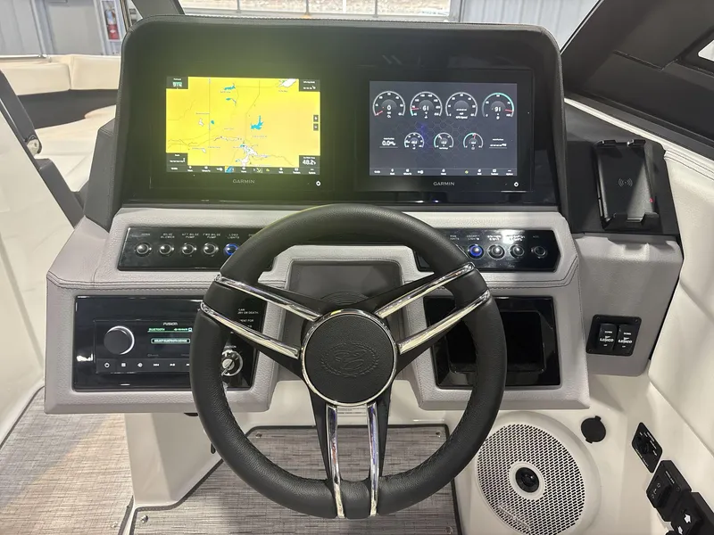 Slide: The Image of 2025 Cobalt R8 Surf dashboard with Garmin displays and steering wheel. - 10