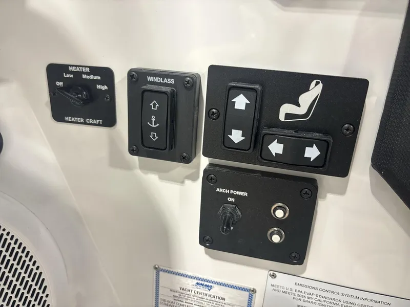 Slide: The Image of Control panel of 2025 Cobalt R8 Surf boat with heater, windlass, and seat adjustments. - 15