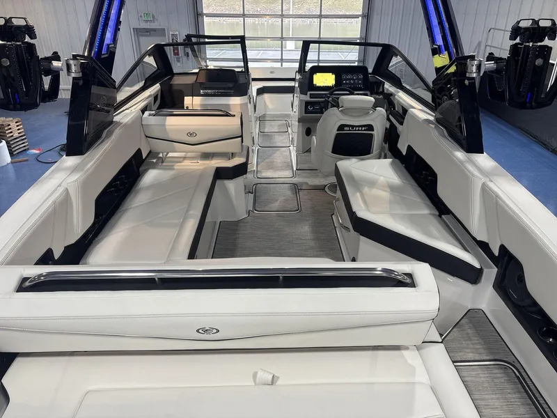Slide: The Image of 2025 Cobalt R8 Surf boat interior with luxurious seating and modern dashboard. - 6
