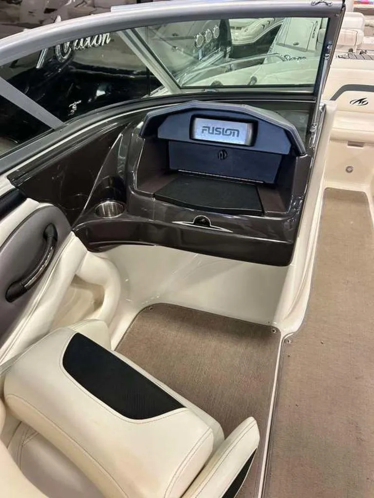 Slide: The Image of Interior of a 2014 Monterey 224FSX boat with Fusion audio system. - 5