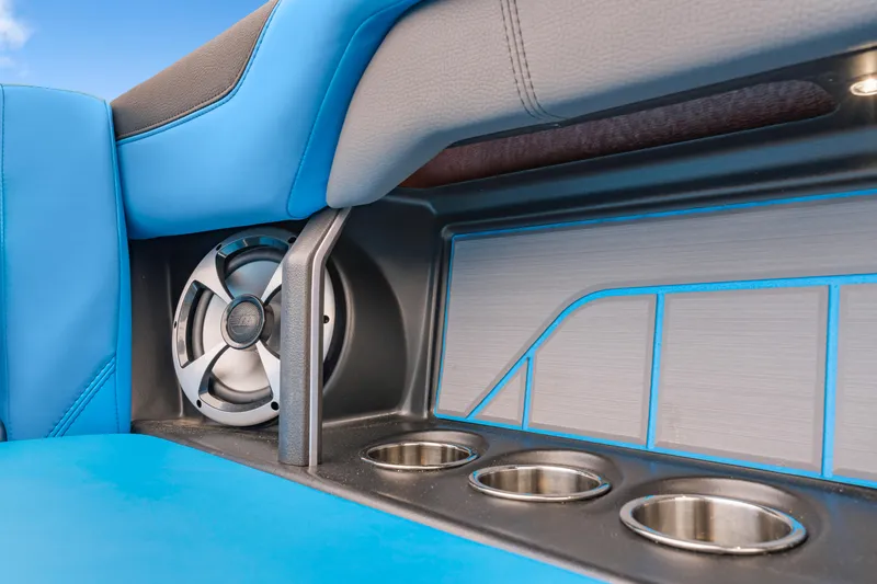 Slide: The Image of 2021 Malibu Wakesetter 25 LSV interior with speaker and cup holders. - 10