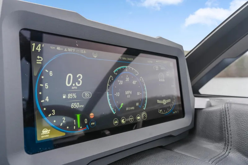 Slide: The Image of Dashboard of 2021 Malibu Wakesetter 25 LSV boat displaying speed and controls. - 23