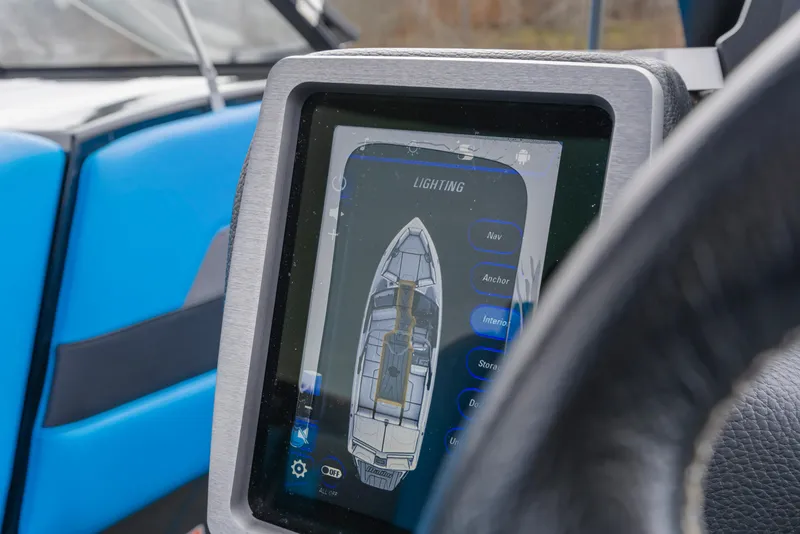 Slide: The Image of Touchscreen control panel in 2021 Malibu Wakesetter 25 LSV boat cockpit. - 24