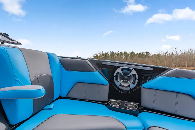 Slide: The Image of Interior of 2021 Malibu Wakesetter 25 LSV with blue and gray seating. - 4