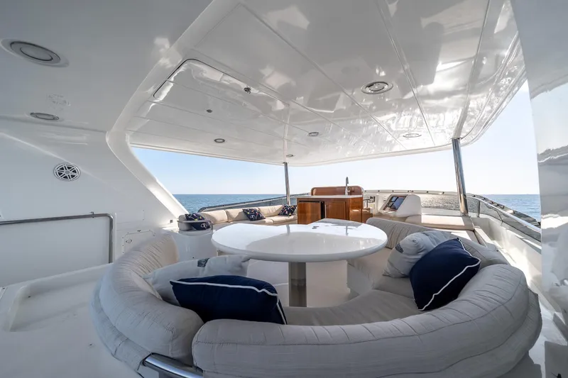 Slide: The Image of Luxurious 2007 MCP Tri-Deck yacht with spacious outdoor seating and ocean view. - 11