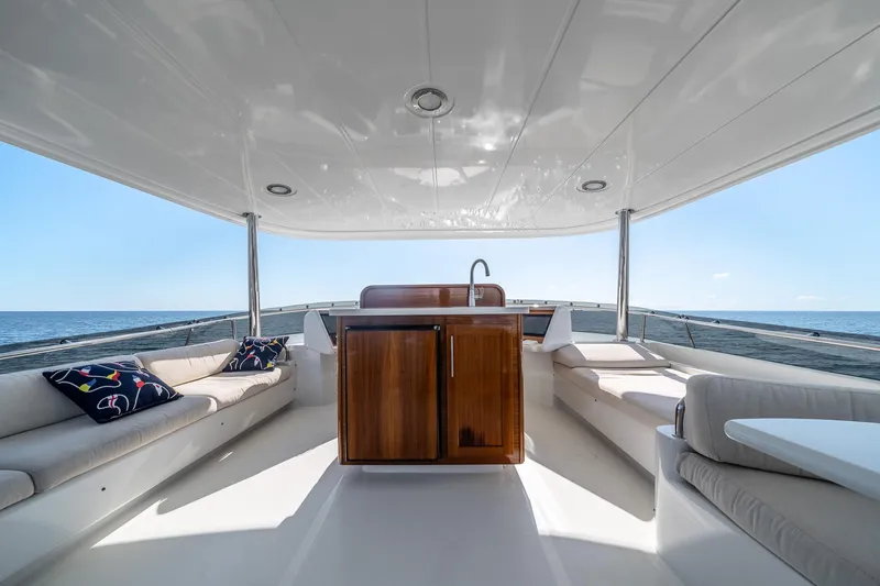 Slide: The Image of Luxurious 2007 MCP Tri-Deck yacht interior with elegant seating and ocean view. - 12
