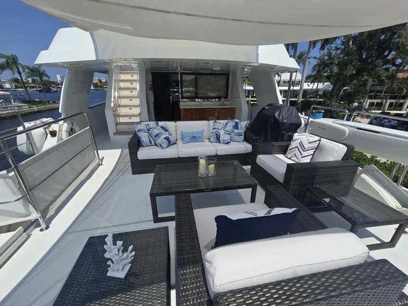 Slide: The Image of Luxurious 2007 MCP Tri-Deck yacht with elegant outdoor seating and modern design. - 14