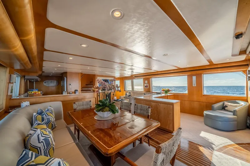 Slide: The Image of Luxurious interior of 2007 MCP Tri-Deck yacht with elegant dining area and ocean view. - 24