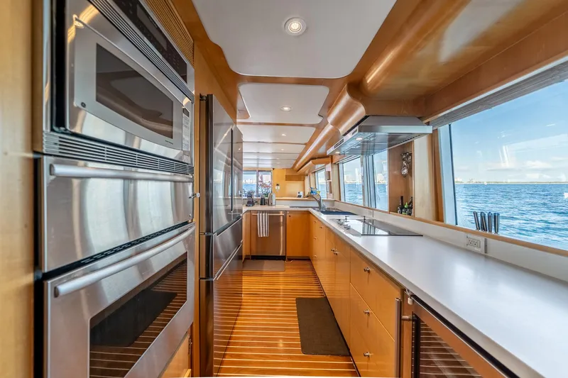 Slide: The Image of Luxurious kitchen interior on 2007 MCP Tri-Deck yacht with ocean view. - 31