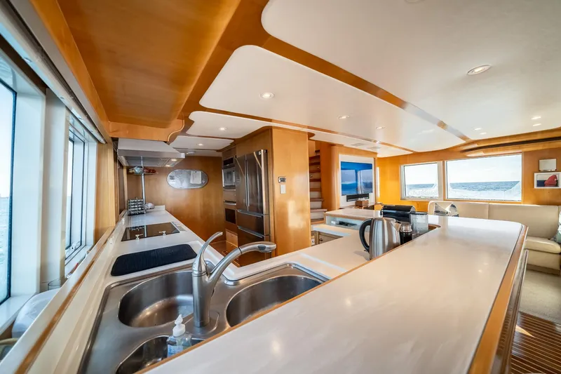 Slide: The Image of Luxurious kitchen interior of 2007 MCP Tri-Deck yacht with modern appliances and ocean view. - 32