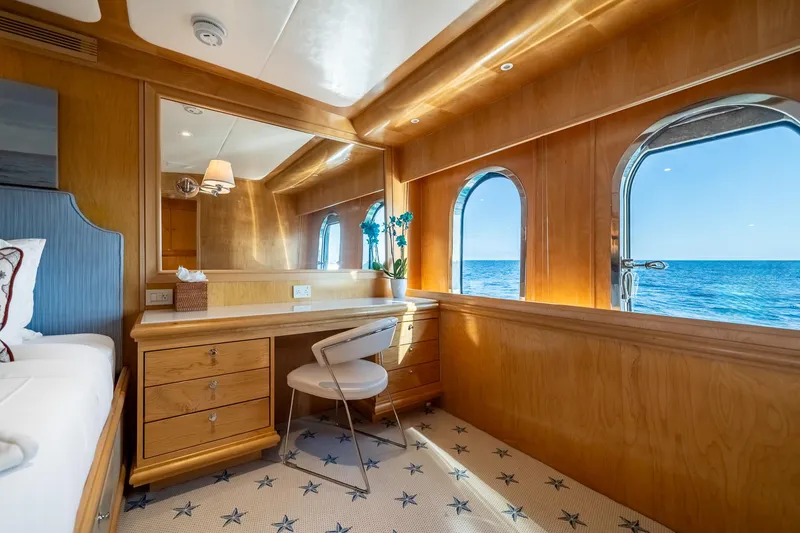 Slide: The Image of Luxurious cabin interior of 2007 MCP Tri-Deck yacht with ocean view through portholes. - 39