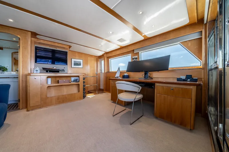 Slide: The Image of Luxurious interior of a 2007 MCP Tri-Deck yacht with modern furnishings and large windows. - 46