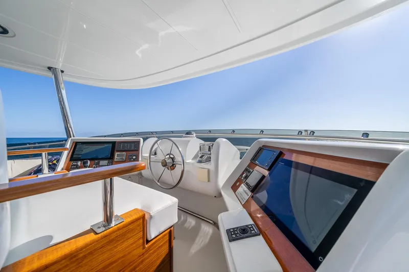 Slide: The Image of Luxurious 2007 MCP Tri-Deck yacht helm with modern navigation equipment and ocean view. - 8