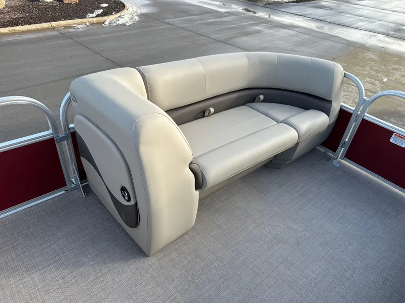 Slide: The Image of 2025 Sun Tracker Party Barge 18 DLX pontoon boat with gray seating. - 4