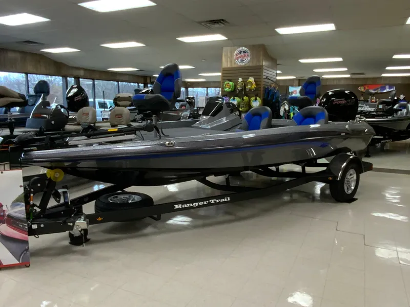 The Image of 2025 Ranger Z185 boat displayed indoors on a trailer. - 1