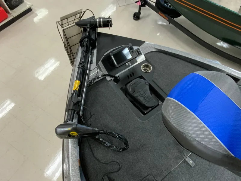 Slide: The Image of 2025 Ranger Z185 boat interior with trolling motor, navigation system, and blue-gray seating. - 10