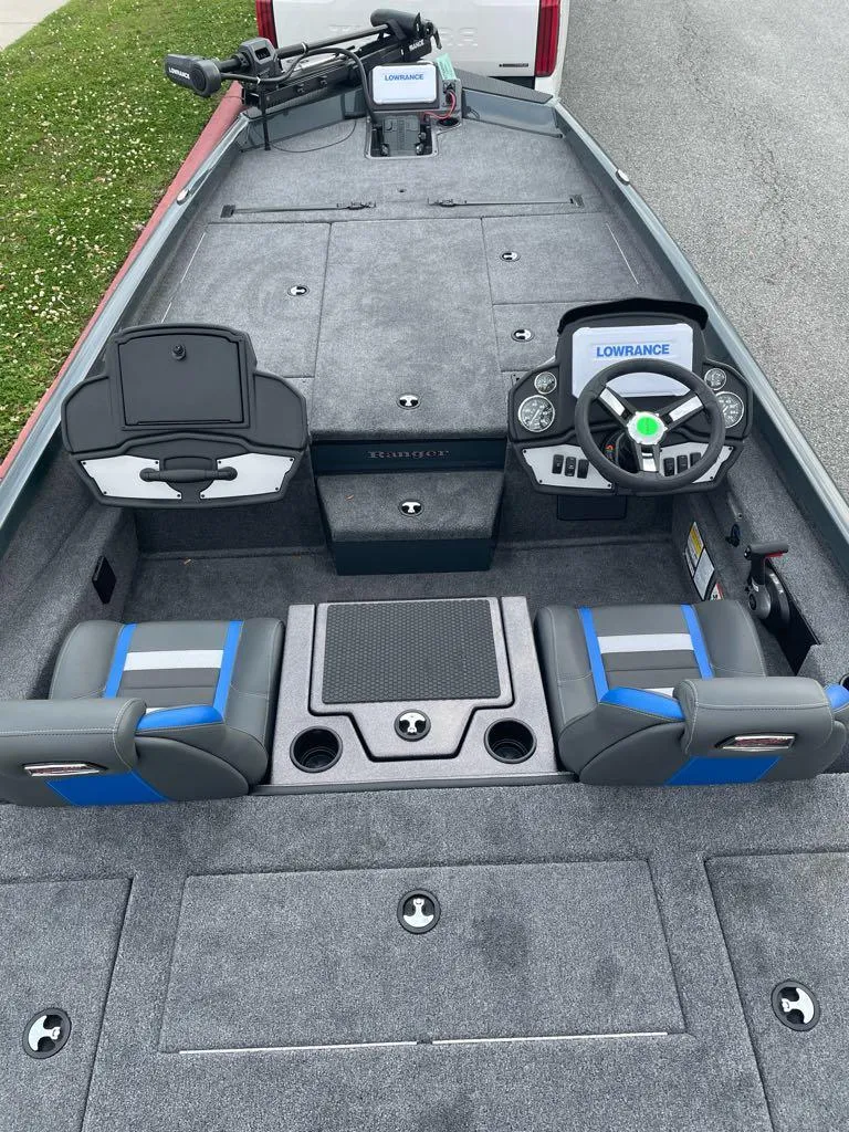 Slide: The Image of 2025 Ranger RT198P fishing boat interior with steering console and seating. - 3