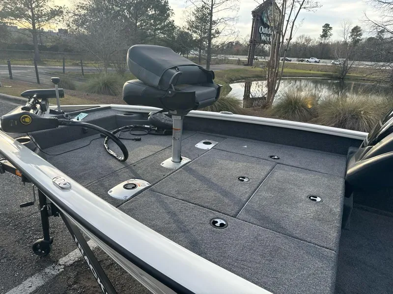 Slide: The Image of 2025 Tracker Pro Team 175 Crappie Edition fishing boat with seating and storage compartments. - 4