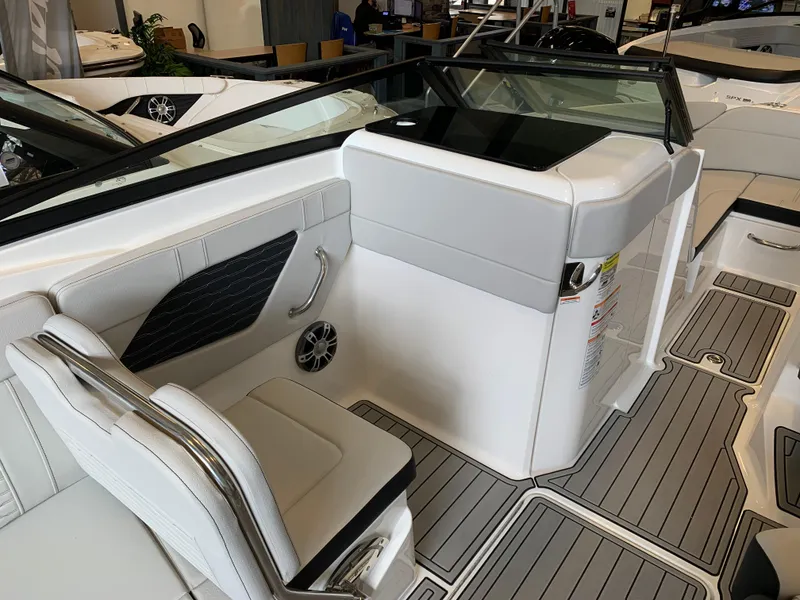 Slide: The Image of 2025 Sea Ray SPX 230 boat interior with sleek seating and modern design. - 4