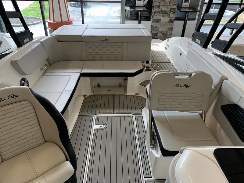 Slide: The Image of Luxurious interior of 2025 Sea Ray SPX 230 boat with elegant seating and modern design. - 9