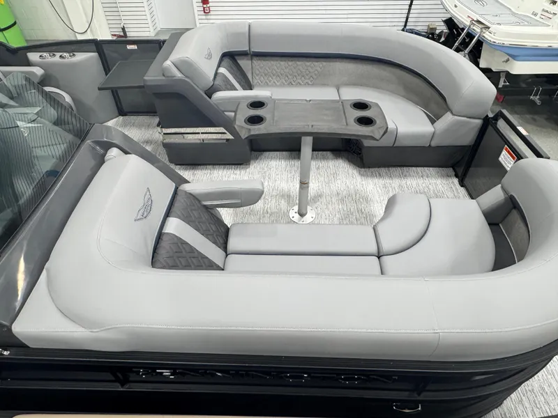 Slide: The Image of 2025 Bennington M Quad Bench 22 MFB with luxurious gray seating and cup holders. - 12