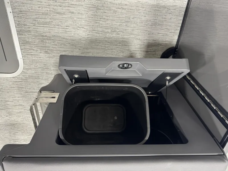 Slide: The Image of Storage compartment in 2025 Bennington M Quad Bench 22 MFB boat. - 17