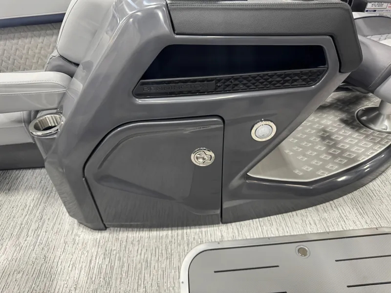 Slide: The Image of 2025 Bennington M Quad Bench 22 MFB interior, featuring sleek storage compartment and modern design. - 18