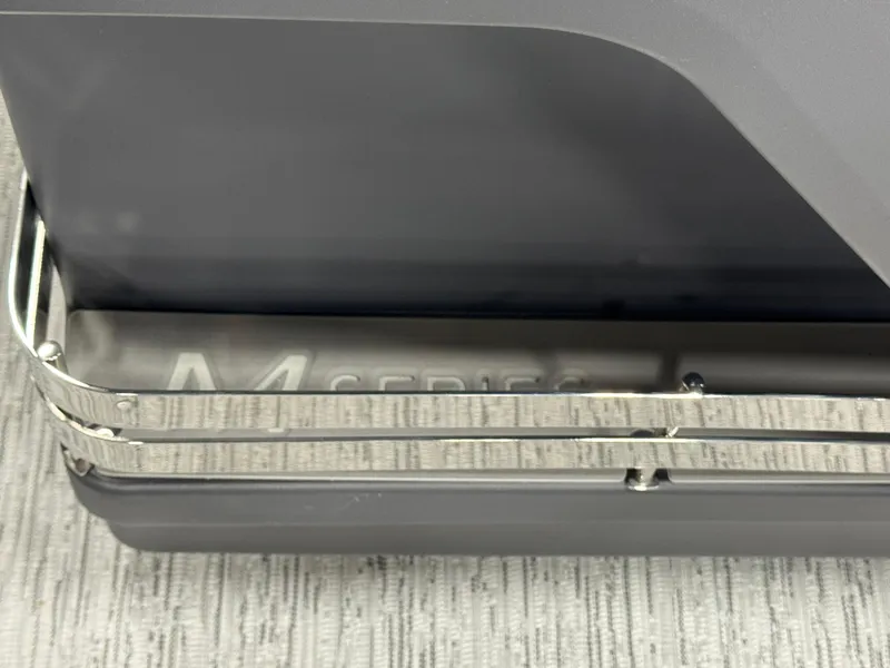 Slide: The Image of 2025 Bennington M Quad Bench 22 MFB, sleek design detail with metallic accents. - 19