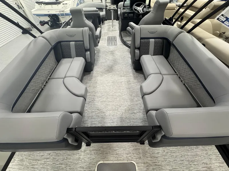 Slide: The Image of 2025 Bennington M Quad Bench 22 MFB with luxurious gray seating and spacious interior. - 7