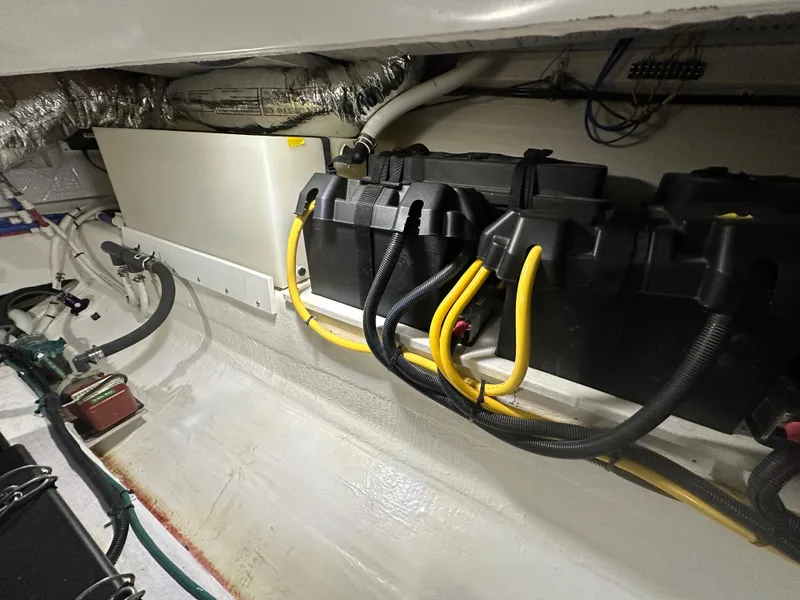 Slide: The Image of Engine compartment of 2018 Back Cove 32 boat with battery setup. - 35